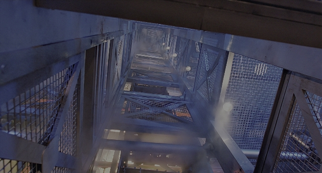 Wide shot frame from Aliens — glass, building