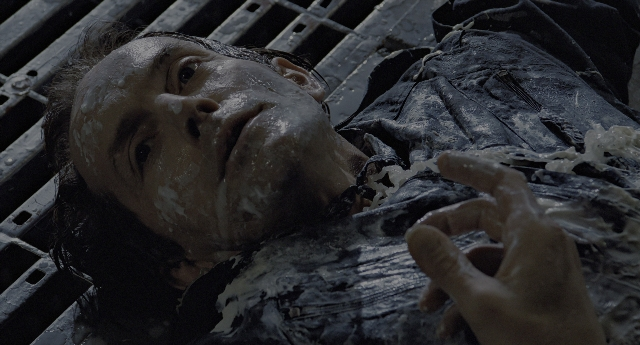 Wide shot frame from Aliens — face, person, human face