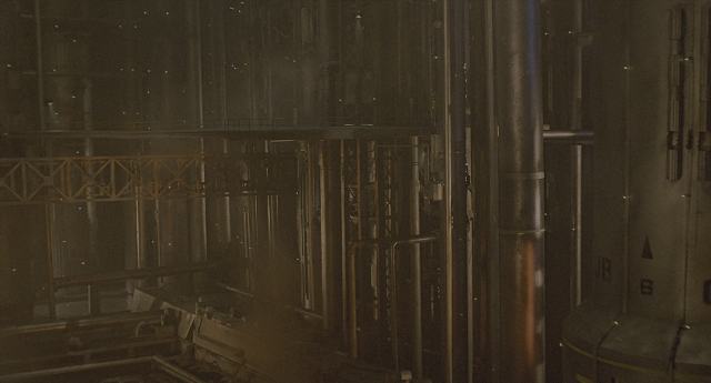 Wide shot frame from Aliens — room, running, building