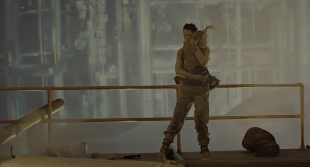 Wide shot frame from Aliens — standing, hair, pipe