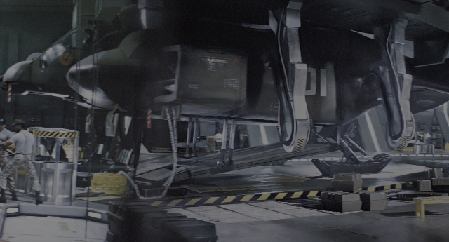Wide shot frame from Aliens — door, airplane, person