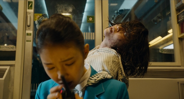 Wide shot frame from Busanhaeng — standing, car, hand