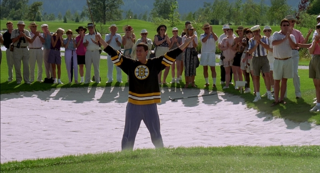 Wide shot frame from Happy Gilmore — standing, hand, shirt