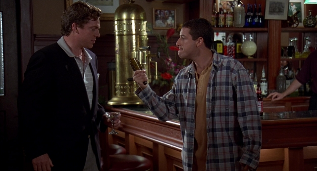 Wide shot frame from Happy Gilmore — standing, dialogue, hand