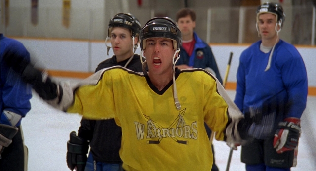 Wide shot frame from Happy Gilmore — standing, hat, person