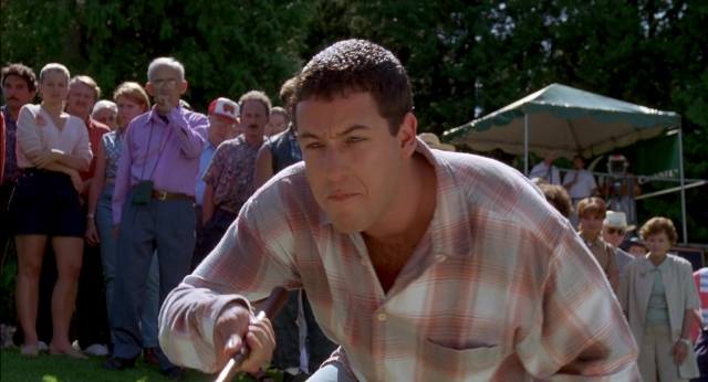 Wide shot frame from Happy Gilmore — sitting, standing, shirt