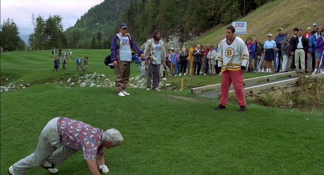 Wide shot frame from Happy Gilmore — standing, shirt, person