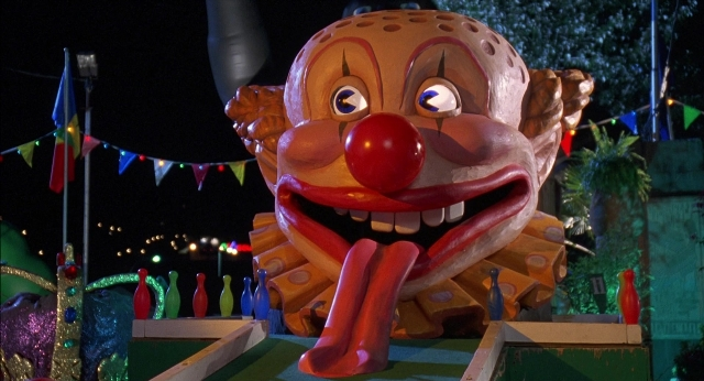 Wide shot frame from Happy Gilmore — human face, statue sculpture