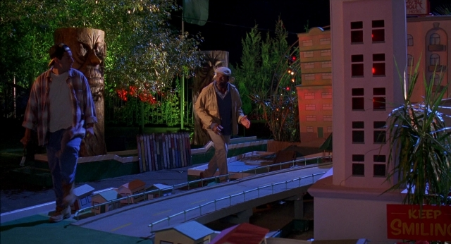 Medium shot frame from Happy Gilmore — walking, night, shirt