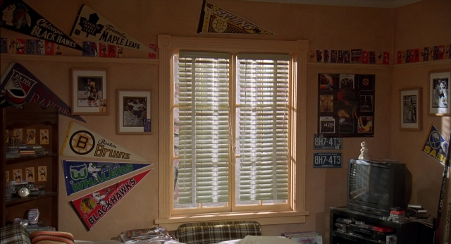 Wide shot frame from Happy Gilmore — room, house, furniture