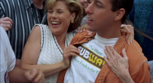 Medium shot frame from Happy Gilmore — face, hug, hair