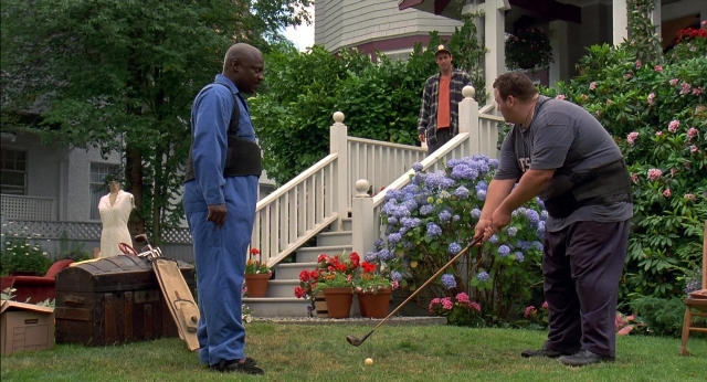 Wide shot frame from Happy Gilmore — standing, flower, person