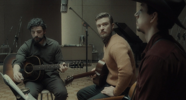 Wide shot frame from Inside Llewyn Davis — sitting, dialogue, microphone
