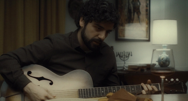 Wide shot frame from Inside Llewyn Davis — sitting, plate, table