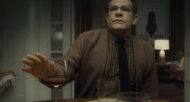 Frame from Inside Llewyn Davis — sitting, plate, room