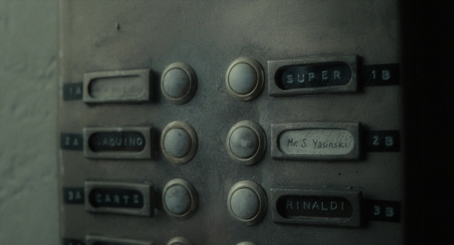 Wide shot frame from Inside Llewyn Davis — corded phone