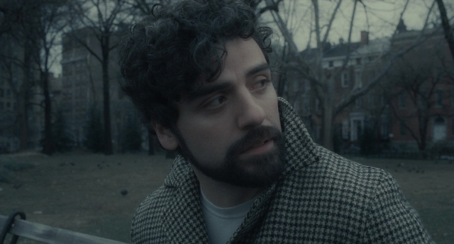 Wide shot frame from Inside Llewyn Davis — sitting, beard, face