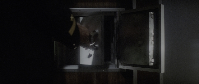 Wide shot frame from The Hunt for Red October — room, door, window