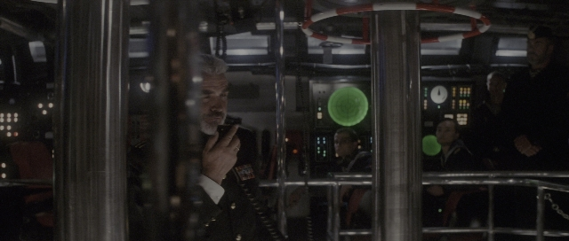 Wide shot frame from The Hunt for Red October — standing, room, dialogue