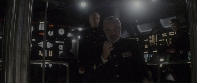Wide shot frame from The Hunt for Red October — standing, room, dialogue