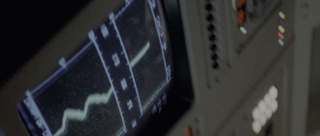 Wide shot frame from The Hunt for Red October — room, phone