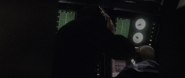 Frame from The Hunt for Red October — sitting, room, hand