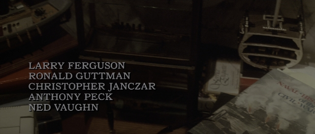 Wide shot frame from The Hunt for Red October — book, boat