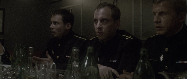 Medium shot frame from The Hunt for Red October — sitting, room, table