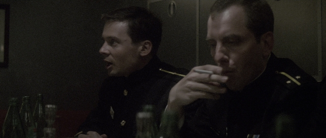 Medium shot frame from The Hunt for Red October — sitting, room, table