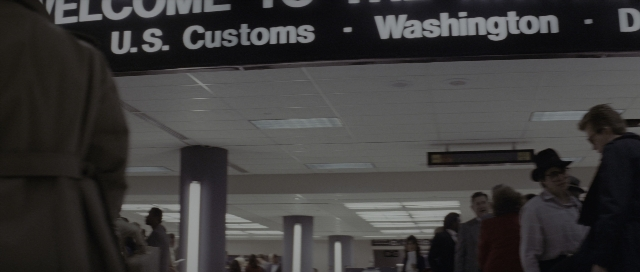 Wide shot frame from The Hunt for Red October — walking, person, human face