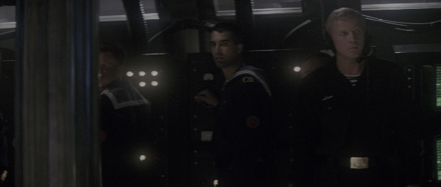 Wide shot frame from The Hunt for Red October — standing, room, dialogue