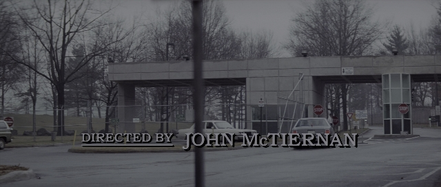 Wide shot frame from The Hunt for Red October — street, car, person