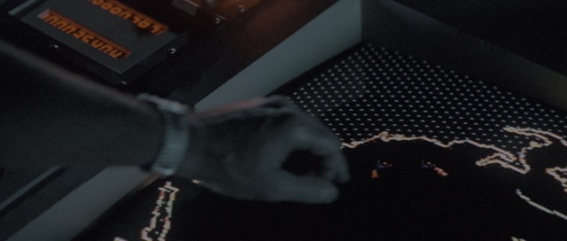 Wide shot frame from The Hunt for Red October — hand, glove, person