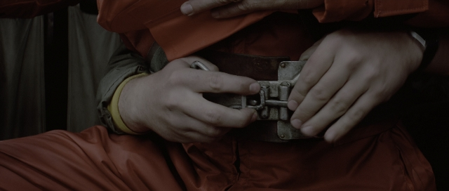 Wide shot frame from The Hunt for Red October — person, human hand