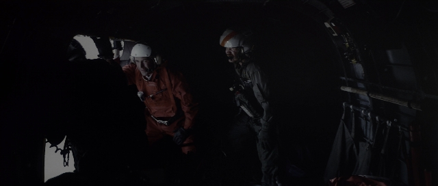 Wide shot frame from The Hunt for Red October — standing, person, human face
