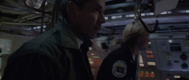 Wide shot frame from The Hunt for Red October — room, dialogue, person