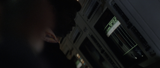 Wide shot frame from The Hunt for Red October — room, face, person