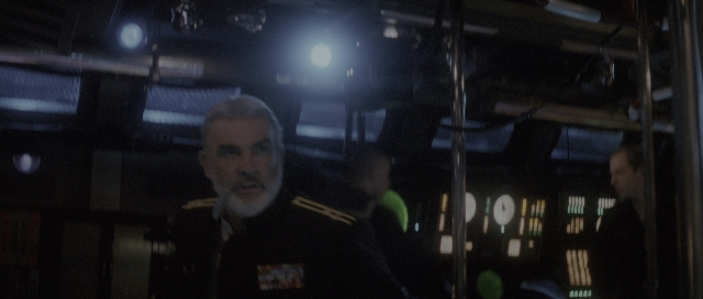 Wide shot frame from The Hunt for Red October — standing, room, uniform