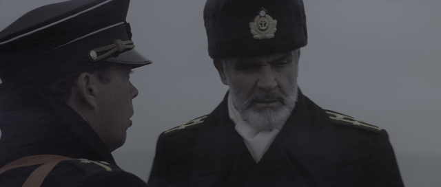 Wide shot frame from The Hunt for Red October — standing, dialogue, hat