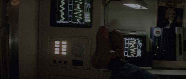 Wide shot frame from The Hunt for Red October — room, person, human face