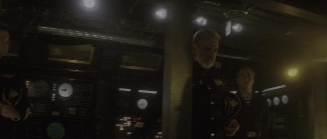 Wide shot frame from The Hunt for Red October — standing, room, person