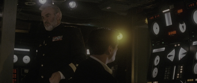 Wide shot frame from The Hunt for Red October — standing, room, uniform
