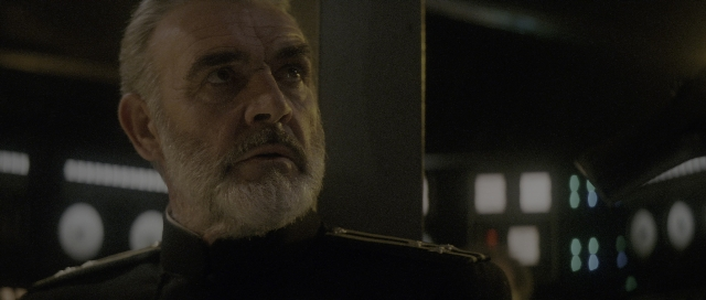 Medium shot frame from The Hunt for Red October — room, uniform, beard