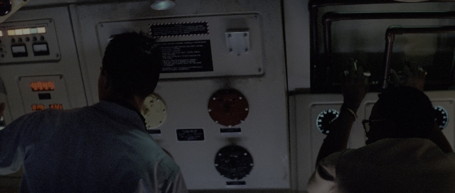 Wide shot frame from The Hunt for Red October — standing, room, person