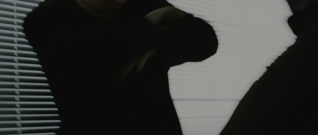Wide shot frame from The Bourne Supremacy — standing, face, person