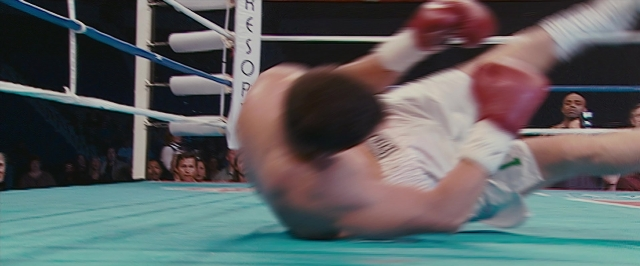 Wide shot frame from The Fighter — person, human face
