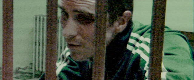 Wide shot frame from The Fighter — room, face, person