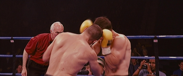Wide shot frame from The Fighter — standing, night, shirt