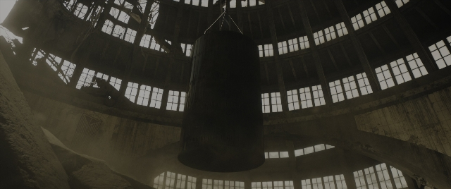 Wide shot frame from The Hunger Games: The Ballad of Songbirds & Snakes — room, window, building