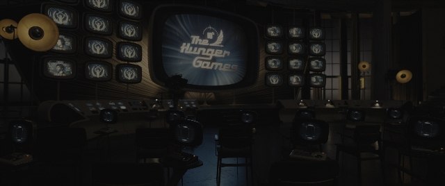 Wide shot frame from The Hunger Games: The Ballad of Songbirds & Snakes — room, furniture
